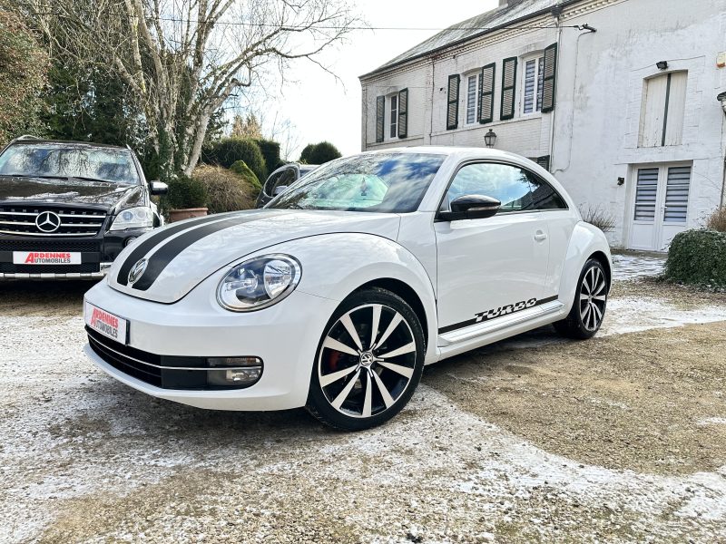 VOLKSWAGEN BEETLE 2011. La location de véhicules chez Auto Dakar inclut une assistance 24h/24 et 7j/7 pour votre tranquillité d'esprit. En cas de panne ou d'incident, notre équipe d'intervention rapide se déplace immédiatement pour résoudre le problème ou vous fournir un véhicule de remplacement.